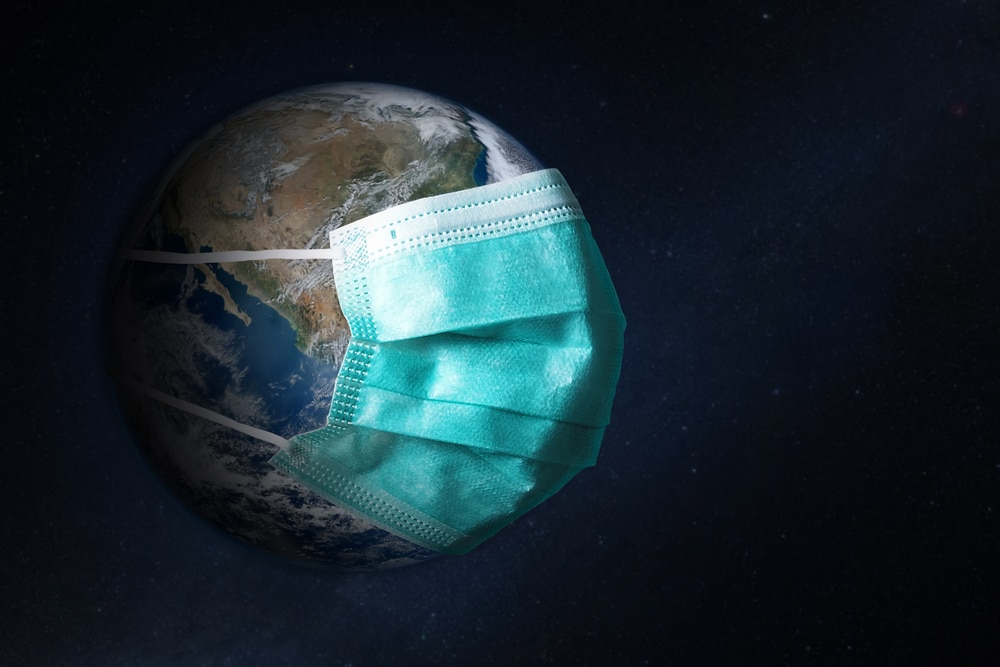 earth wearing a surgical mask